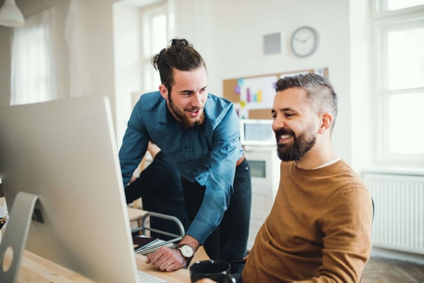 People collaborating at computer