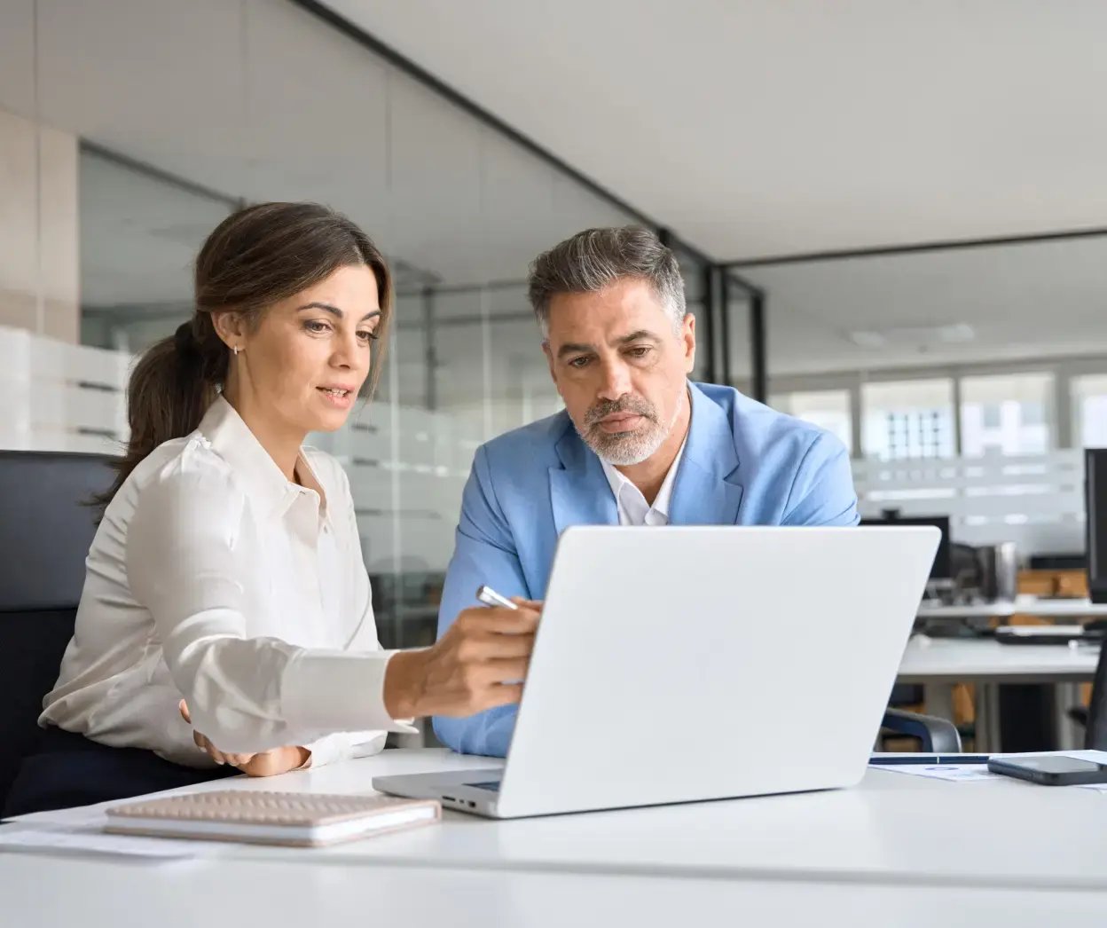 two people on laptop